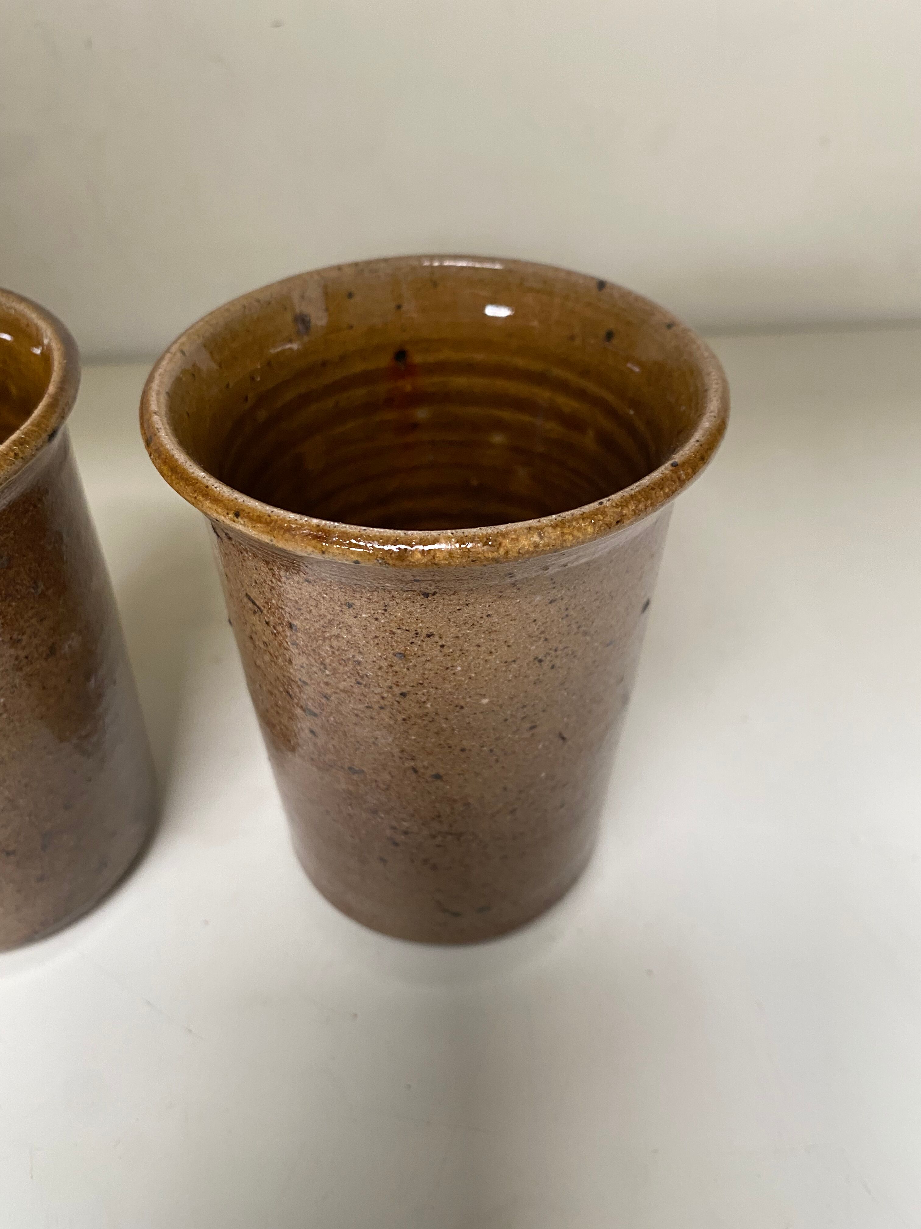 Pair of sandstone mugs