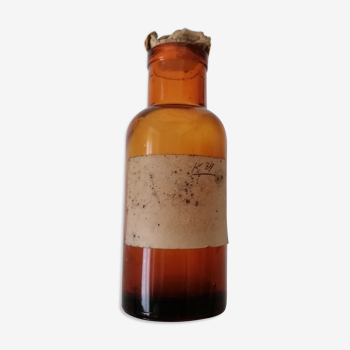 Old amber pharmaceutical bottle