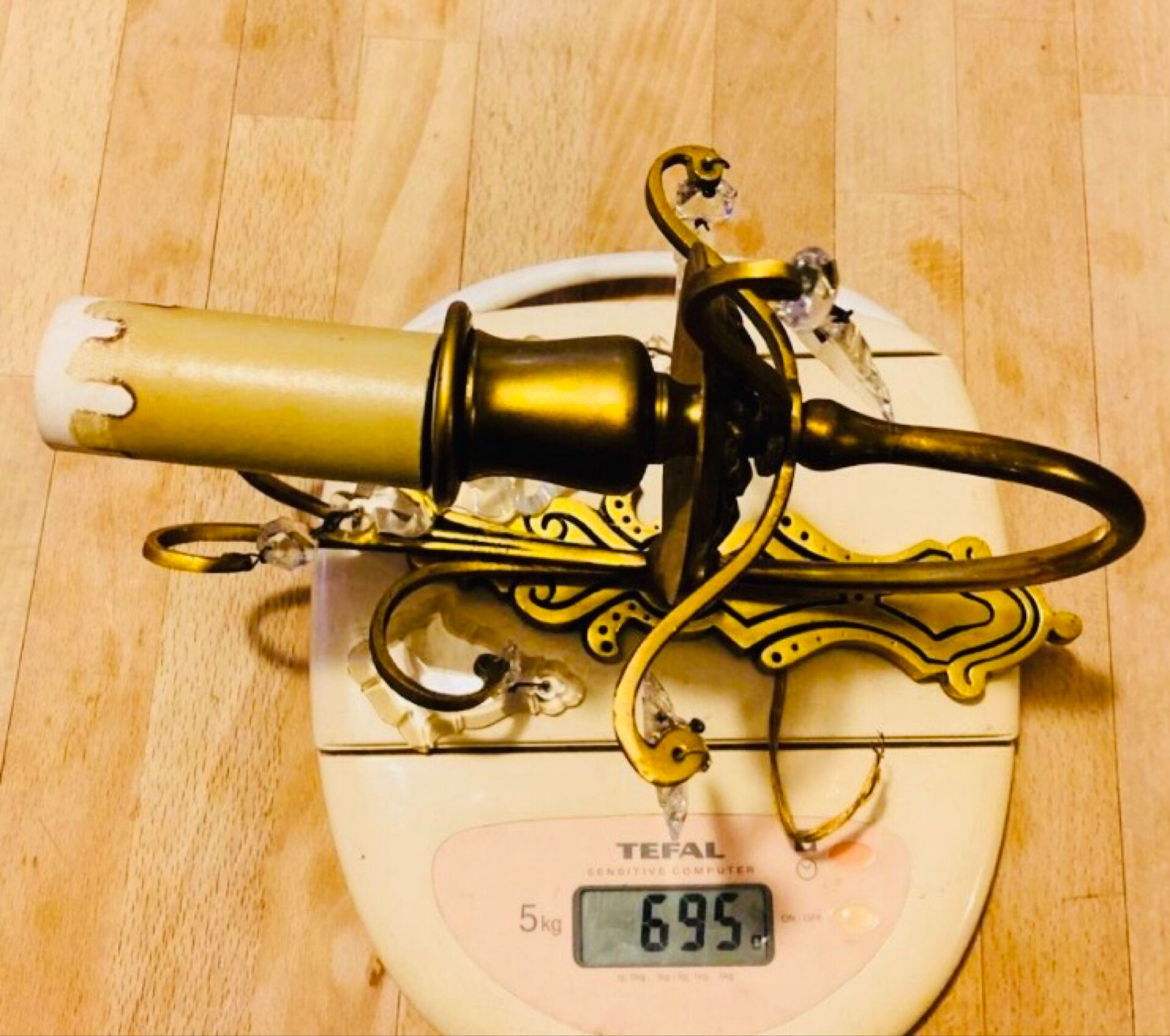 Brass wall light with glass pendants from the mid-20th century.