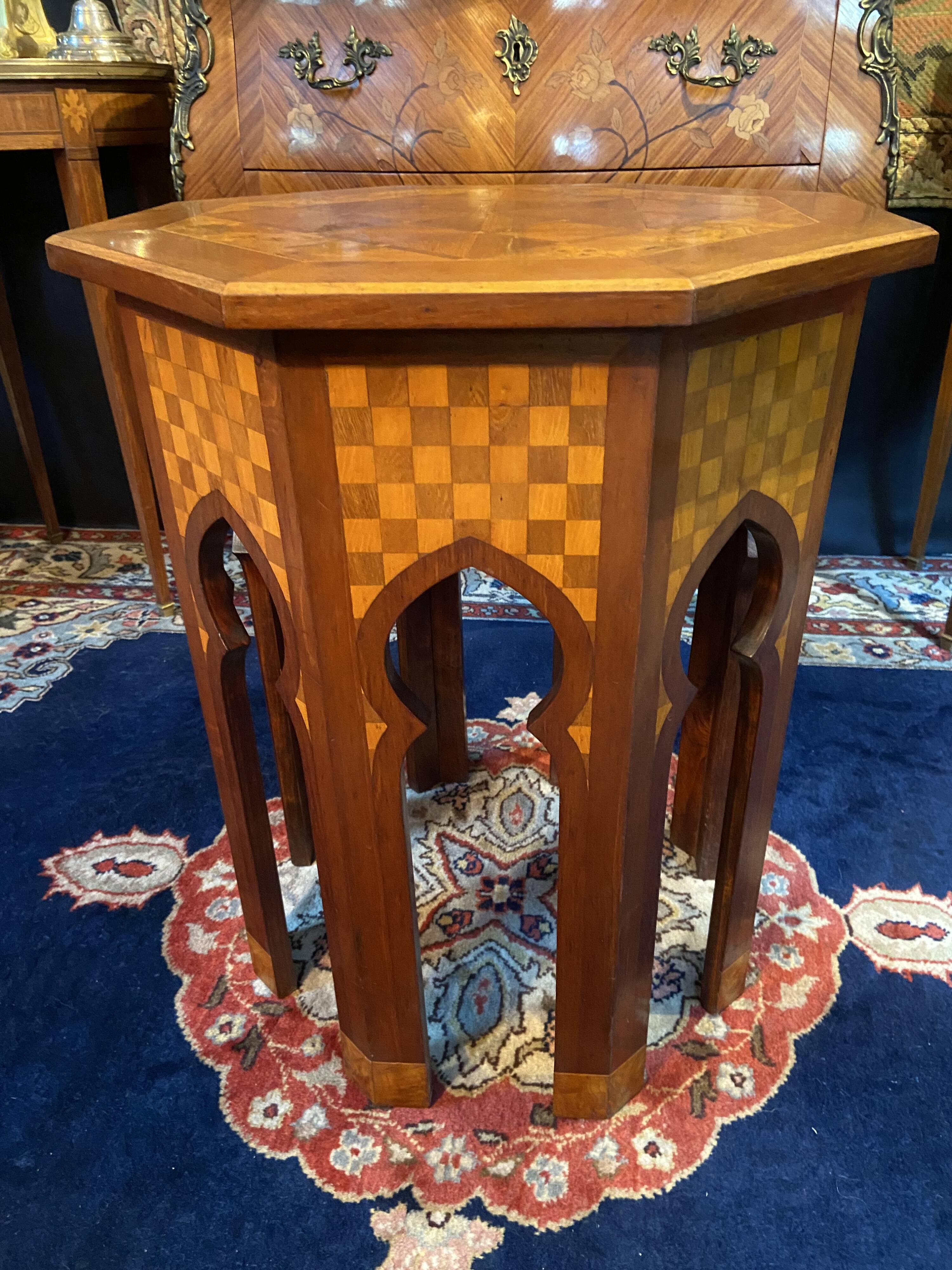 Thuyawood tea table with marquetry decoration.