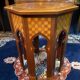 Thuyawood tea table with marquetry decoration.
