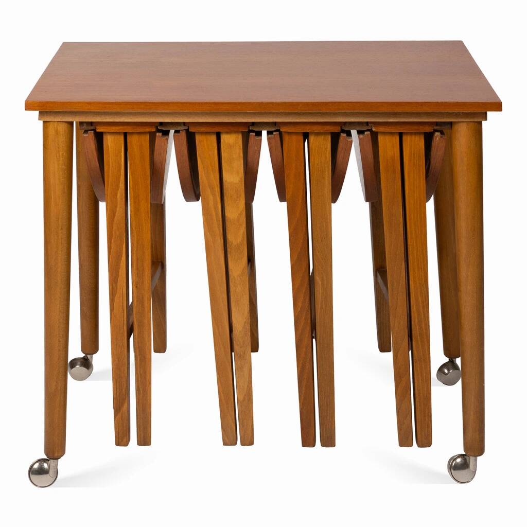 Table and four chairs set by Paul Hundevad