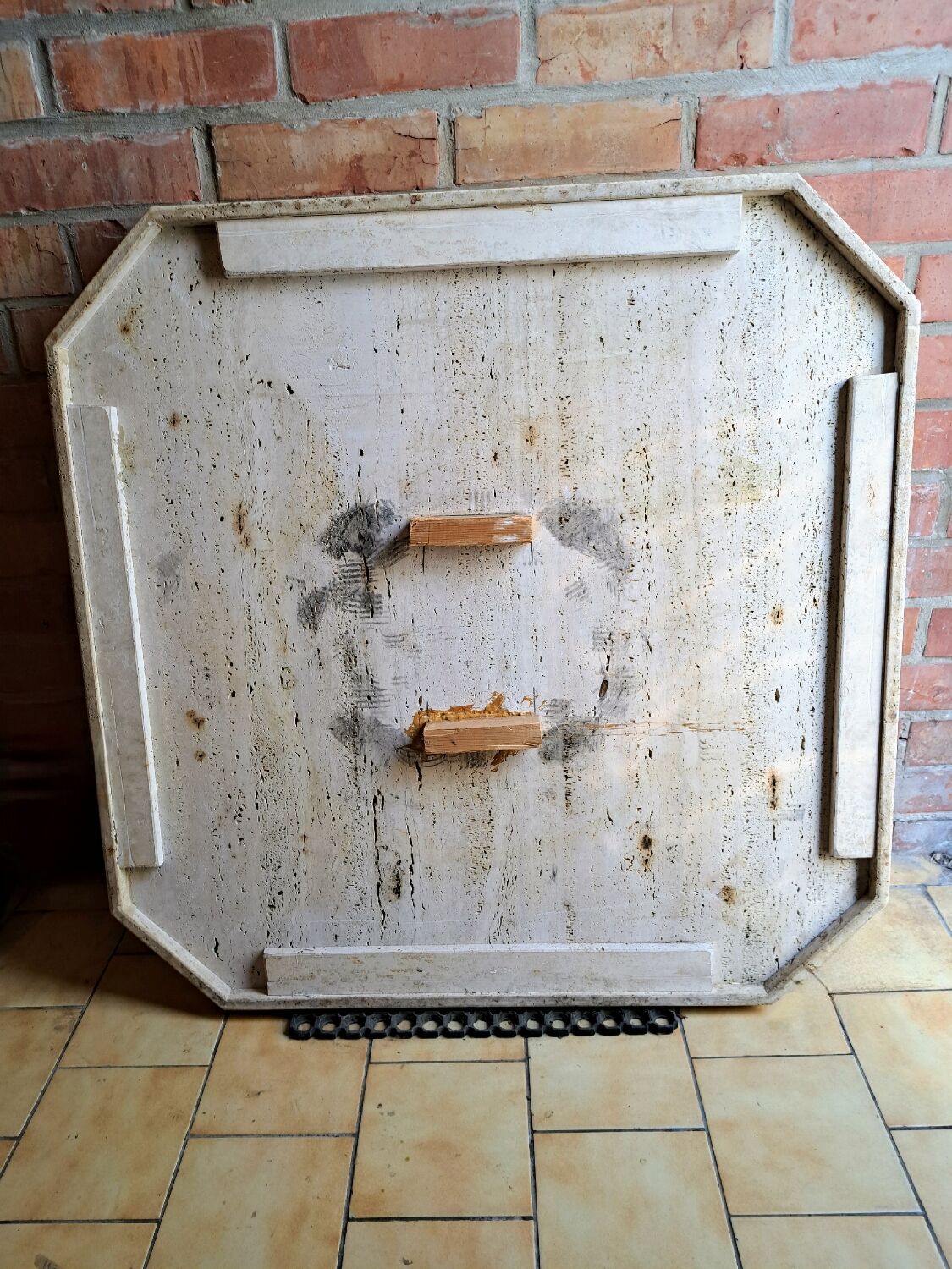 Travertine and brass coffee table