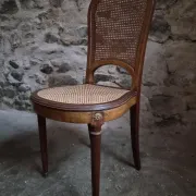 Set of 6 antique Louis XVI style dining chairs with caning.
