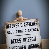 Enamelled plate defense display