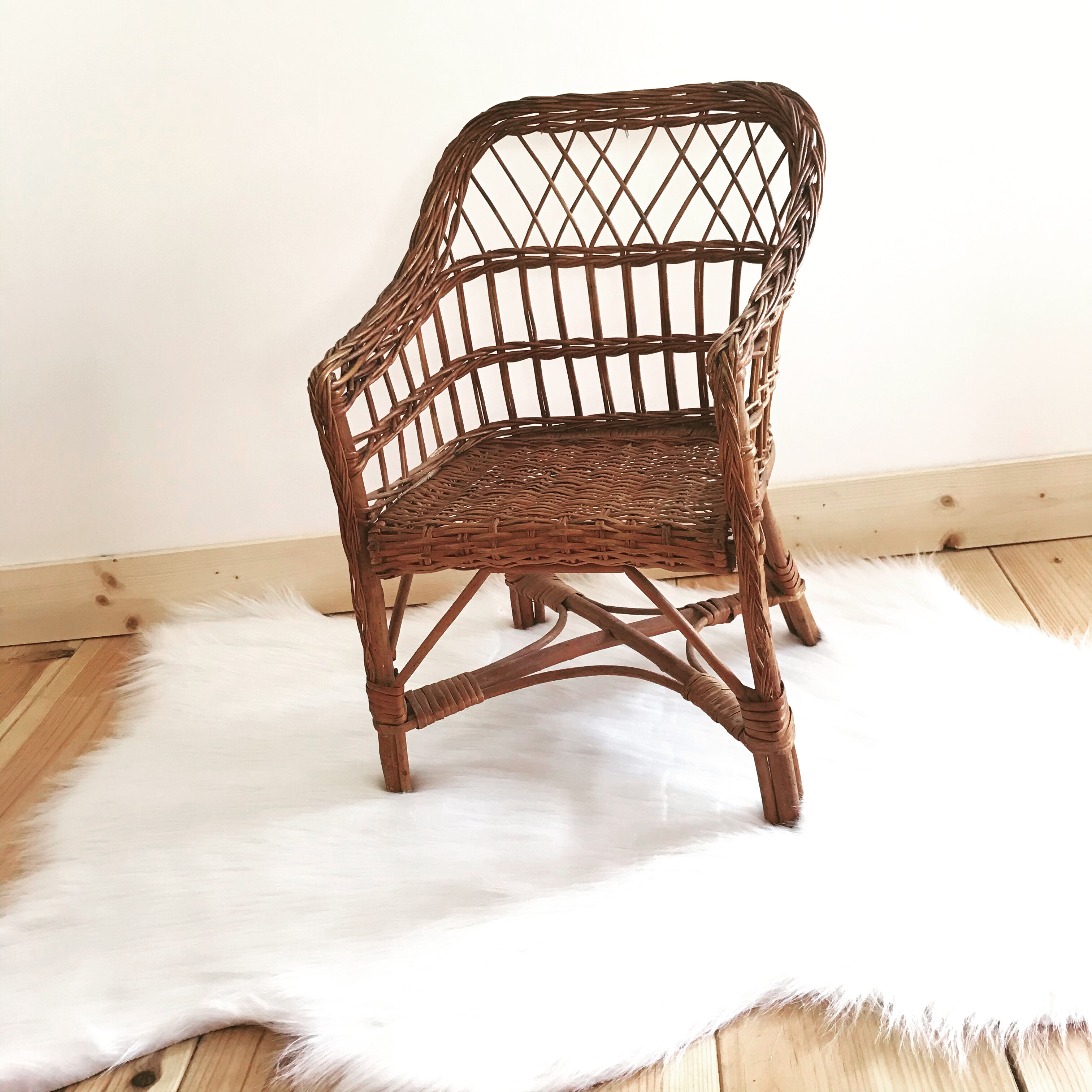 Vintage wicker children's armchair