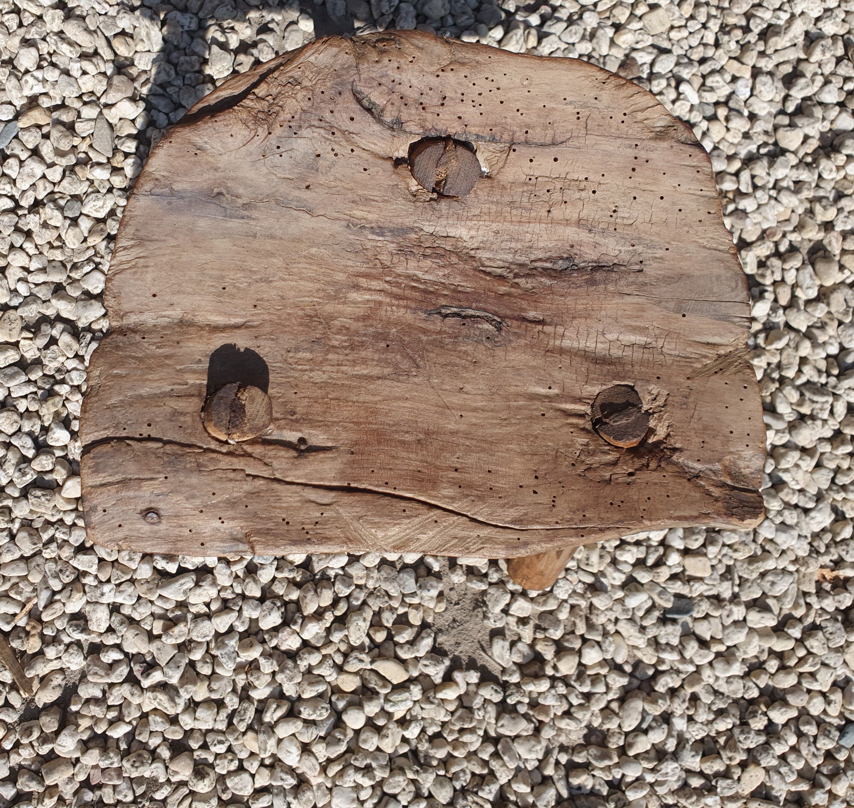 Ancient tripod milking stool