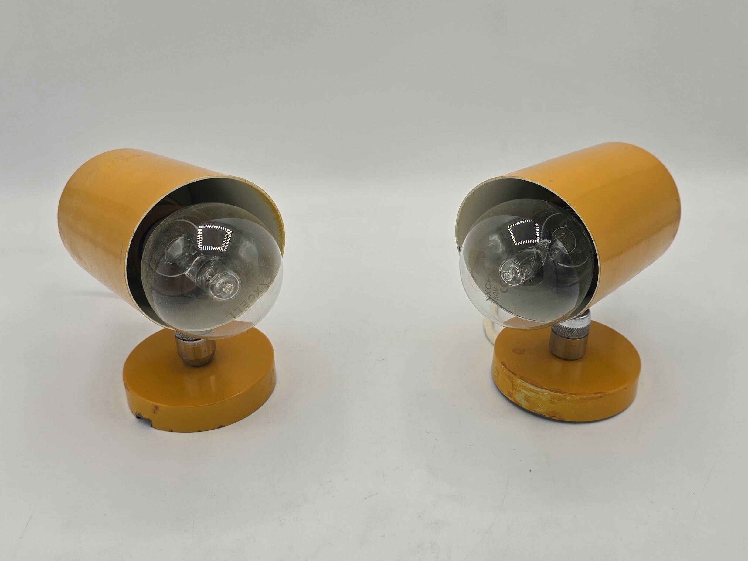 Pair of yellow Space Age wall lights from the 1960s.