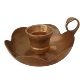 Brass candle holder in the shape of a flower.