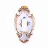 A pair of porcelain wall lamps from Capodimonte, Italy.