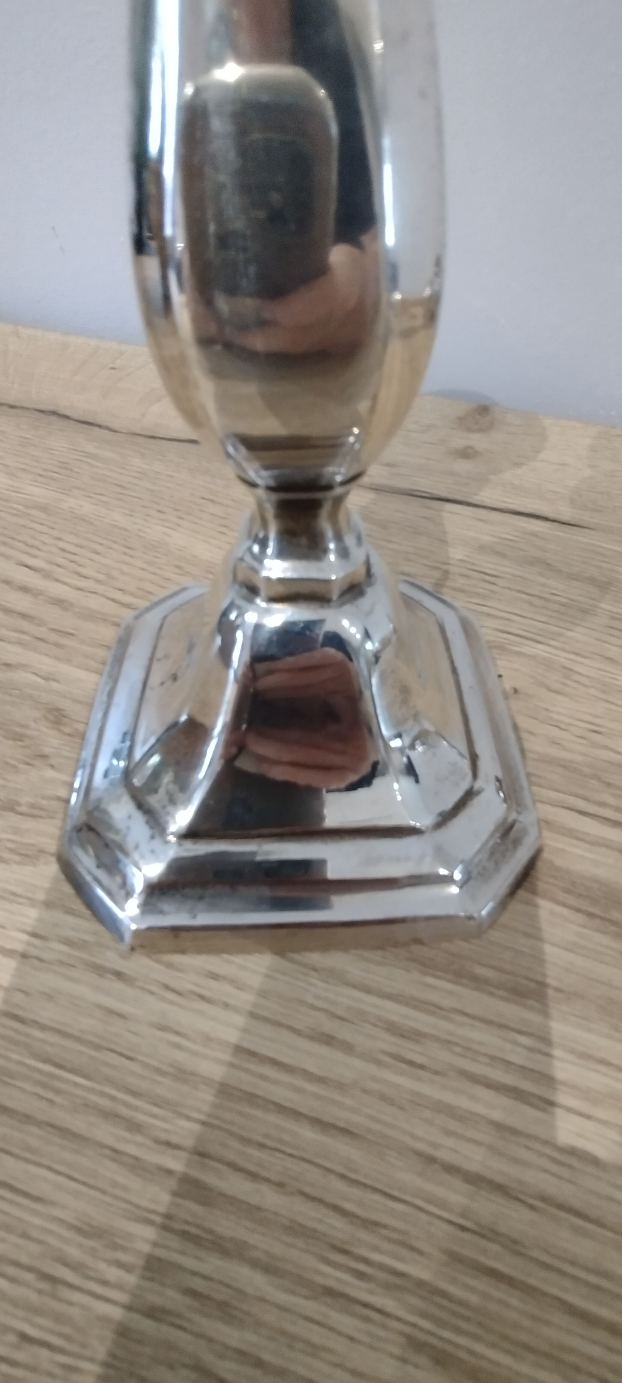 Pair of silver metal candle holders