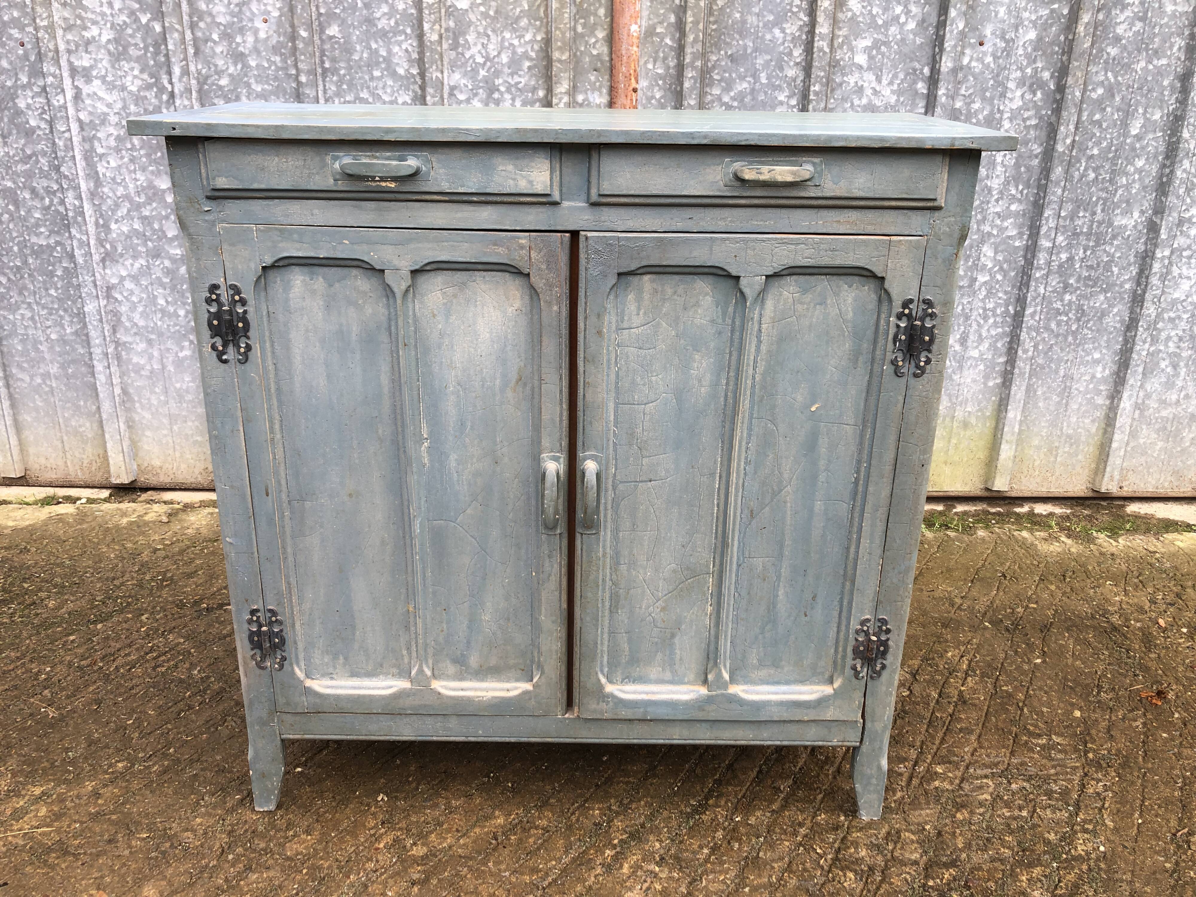 Parisian sideboard painted in blue with 2 doors and 2 drawers.