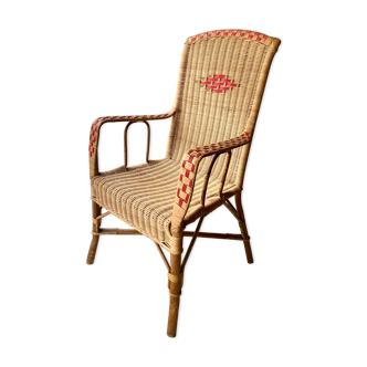 Vintage braided rattan armchair
