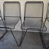 4 gridded metal chairs