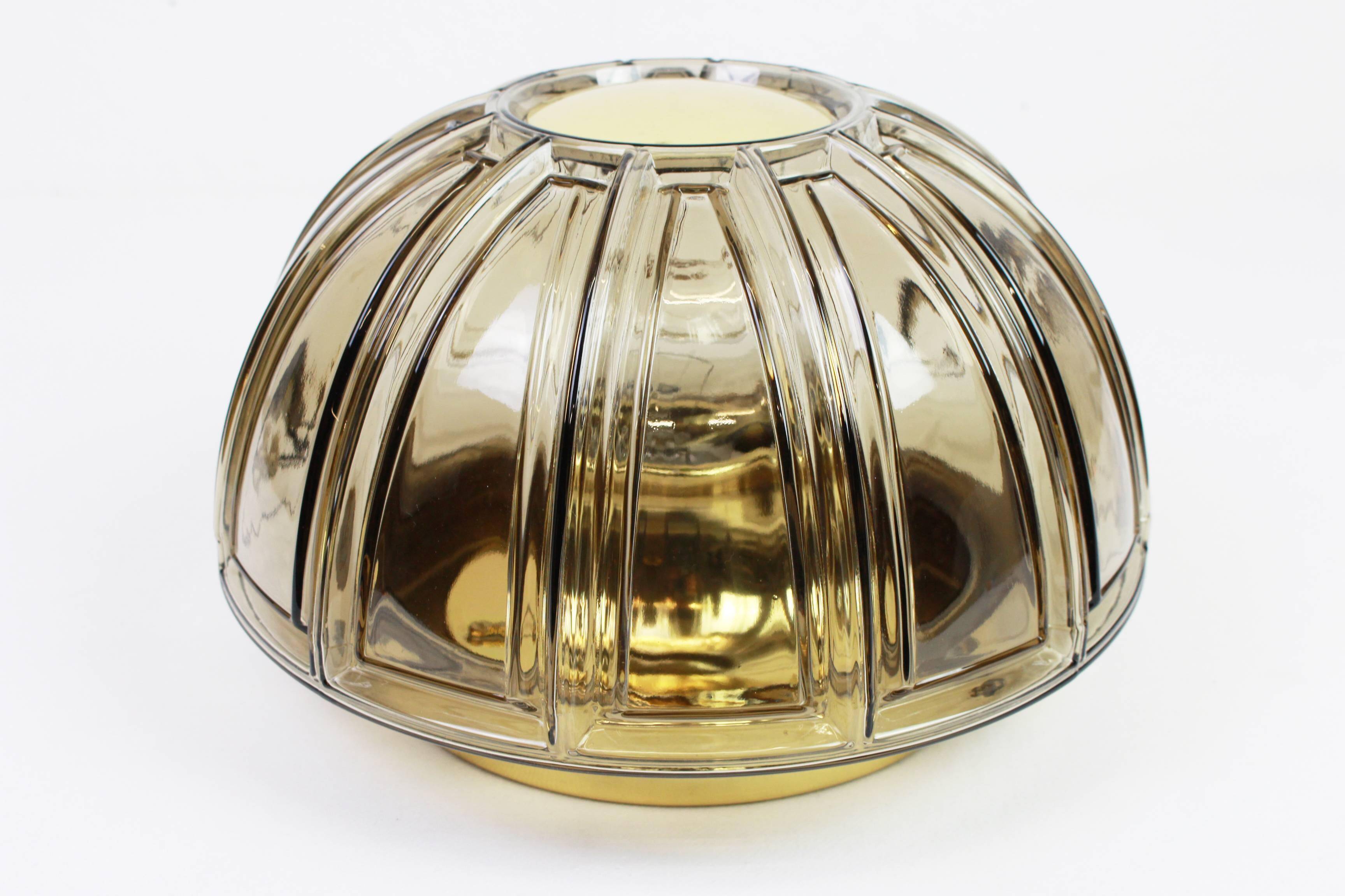 Pair of wall lights or ceiling lights in brass and amber glass by Limburg, Germany, 1960s.