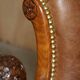 Chesterfield Regency 1810 antique canapé restored in leather with a carved frame.
