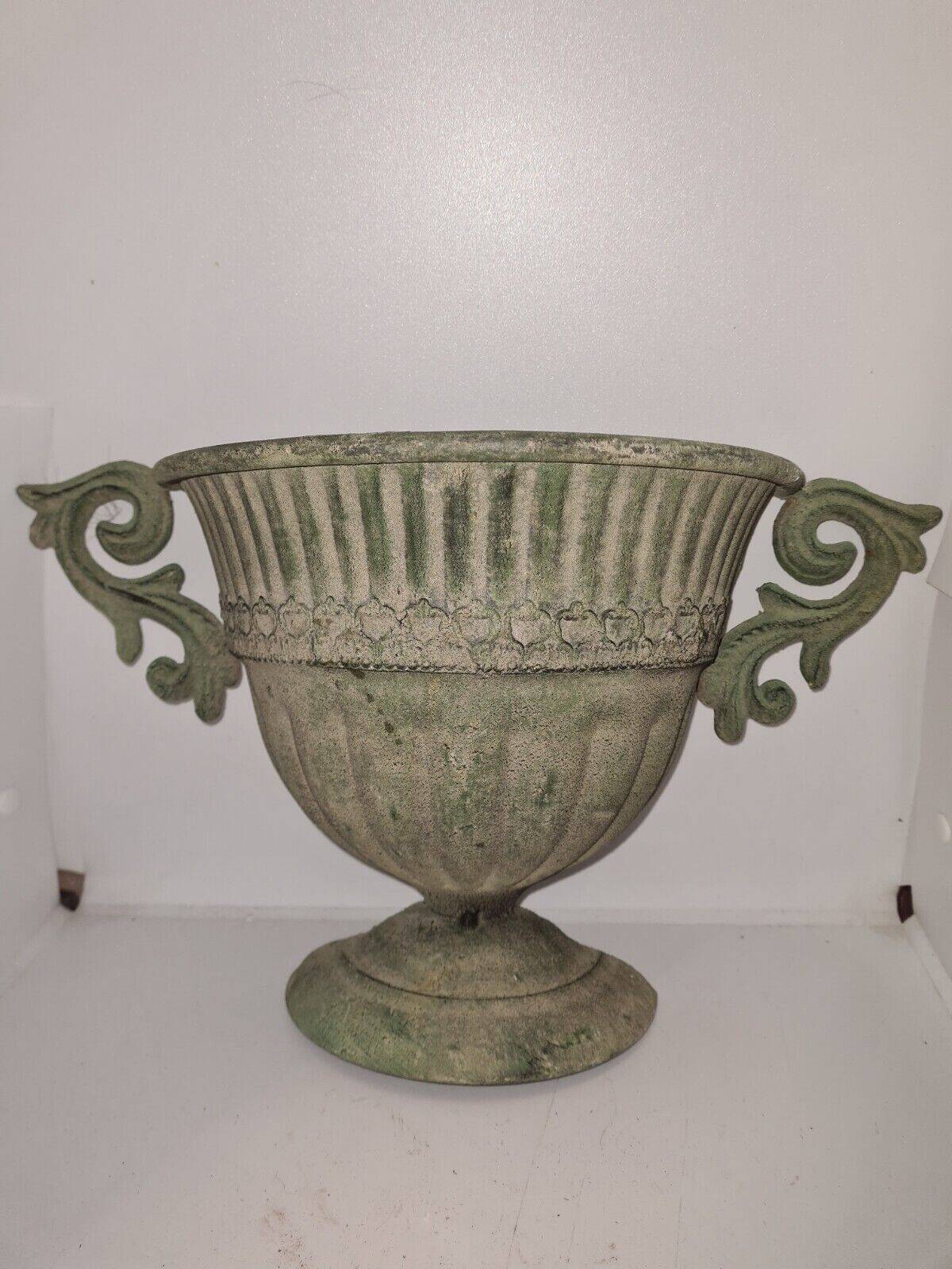 Medici wall vase in patinated iron