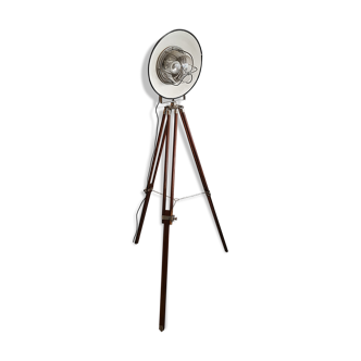Former industrial projector on wooden tripod