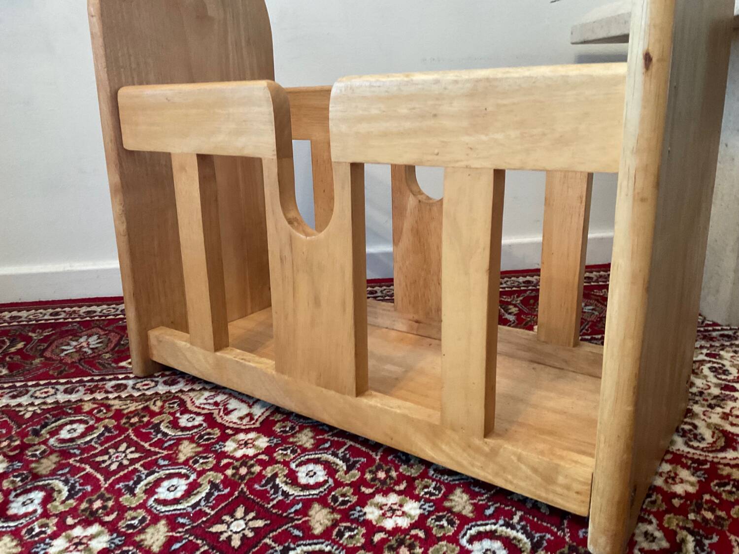 Vintage magazine rack in blond wood