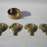 4 brass ashtrays in their 1970 case