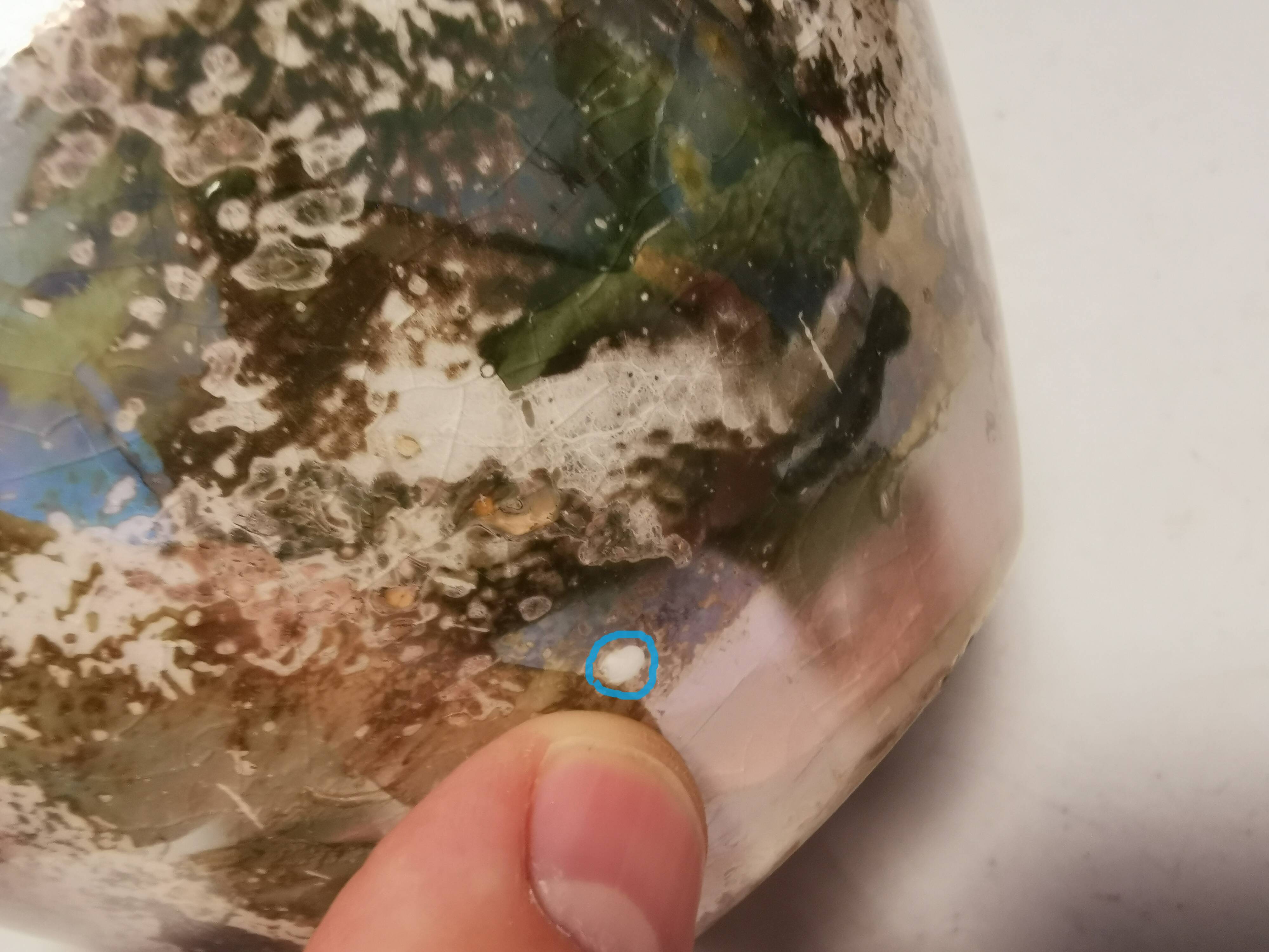 A set from Finnish Arabia, consisting of an Art Deco vase and matching dish, marbled lustre glaze.