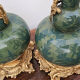 Pair of Chinese export porcelain vases in Louis XVI style mounted in gilded bronze