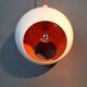 White openwork pendant light with orange interior 1970/1980.