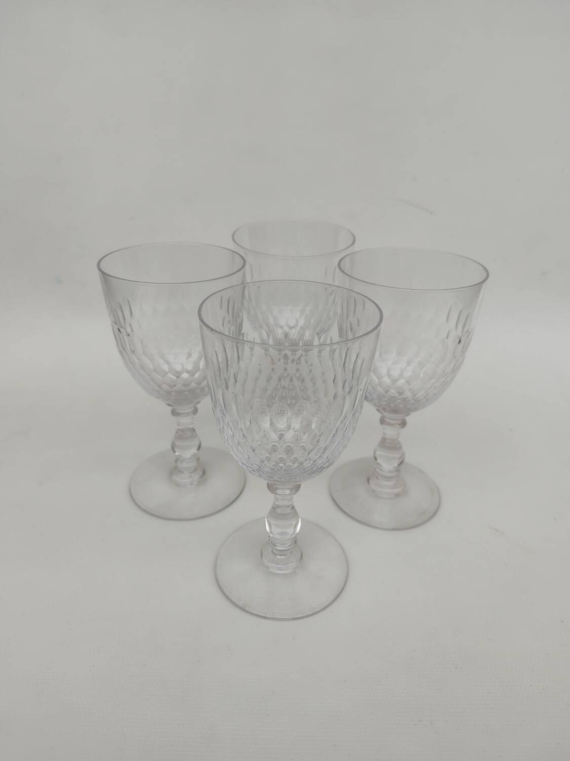 4 large crystal glasses by Baccarat, model Scales, from around 1920.