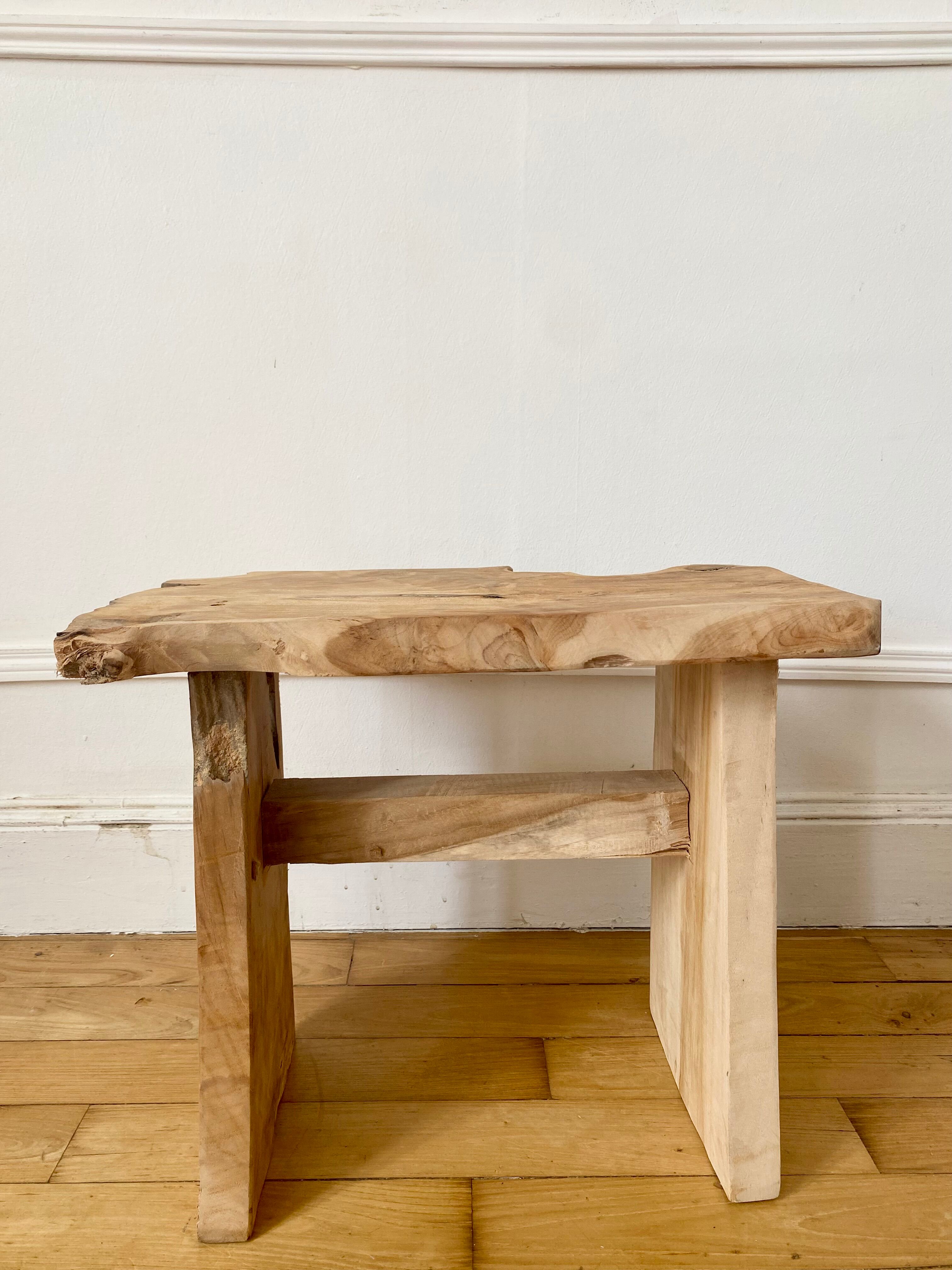 Low stool in raw wood