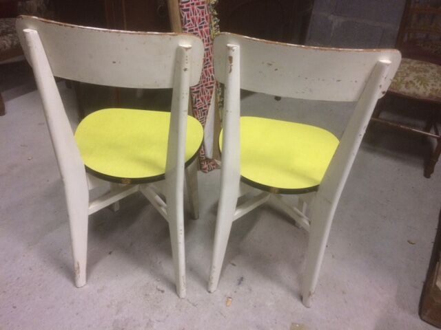 2 sun yellow formica chairs