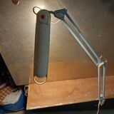 Articulated blue desk lamp