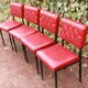 Série de 4 chaises rouges en skaï années 50