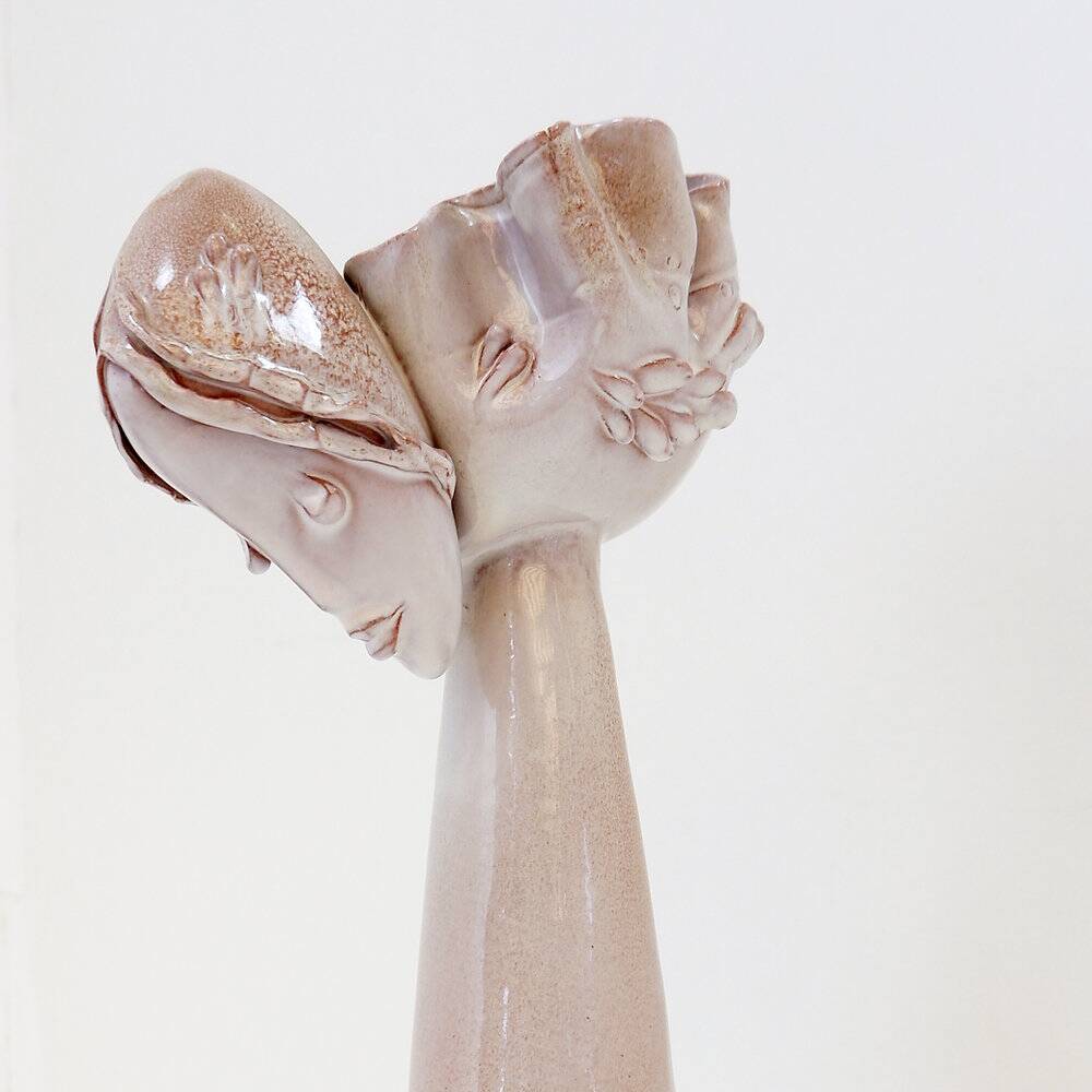 Ceramic sculpture of a female face - flower vase decoration