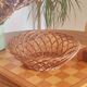 Vintage woven wicker round basket for fruits or bread.