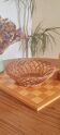 Vintage woven wicker round basket for fruits or bread.