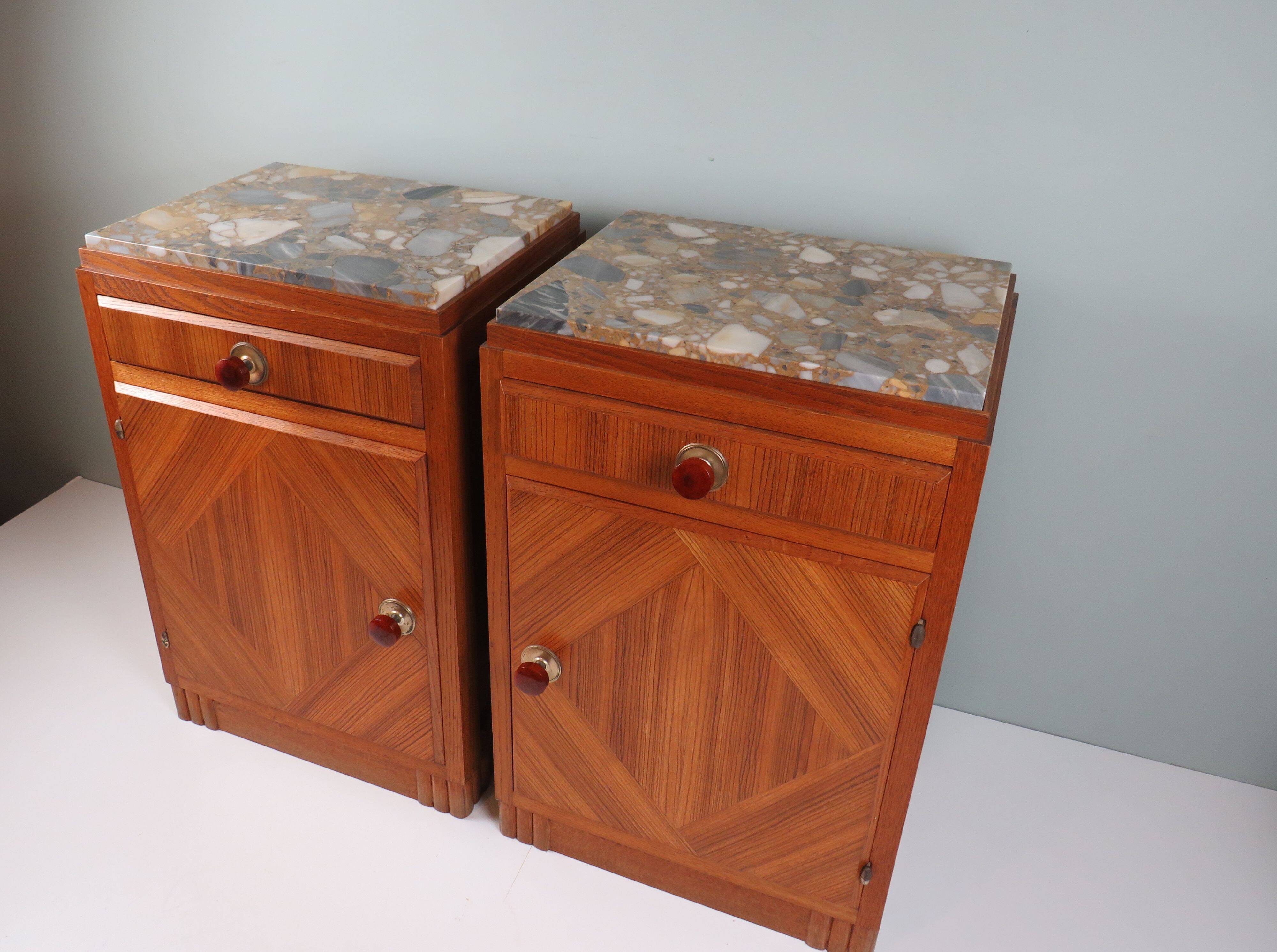 Art Deco bedside tables in oak with an inlaid marble top.