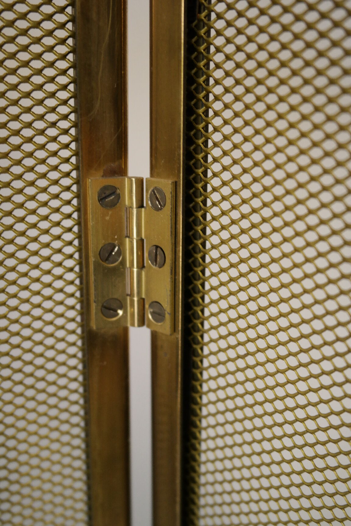 Vintage brass chimney firewall