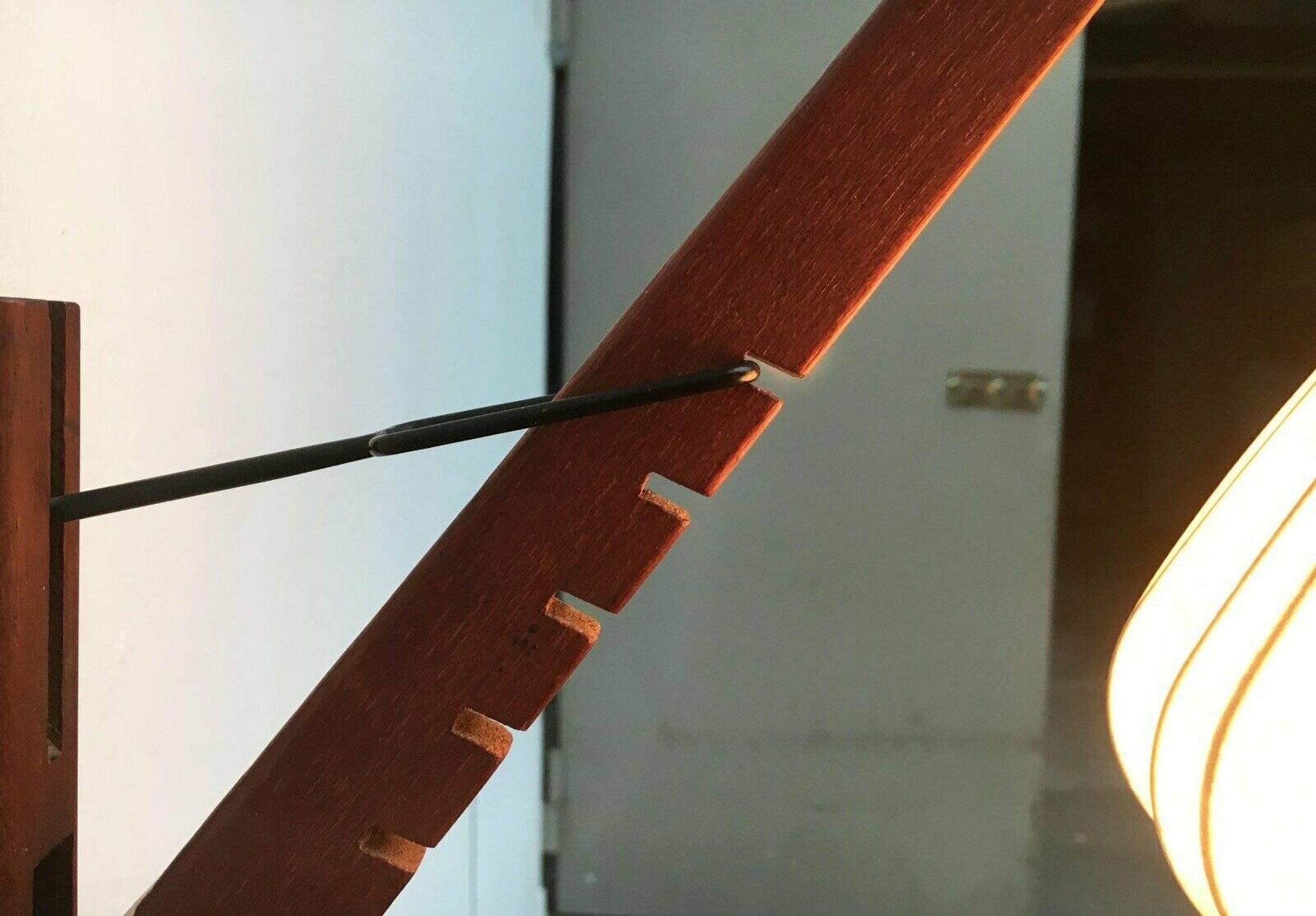 Mid-century pivoting wall lamp with a swing arm, Cocoon, made of teak wood, 1960s.