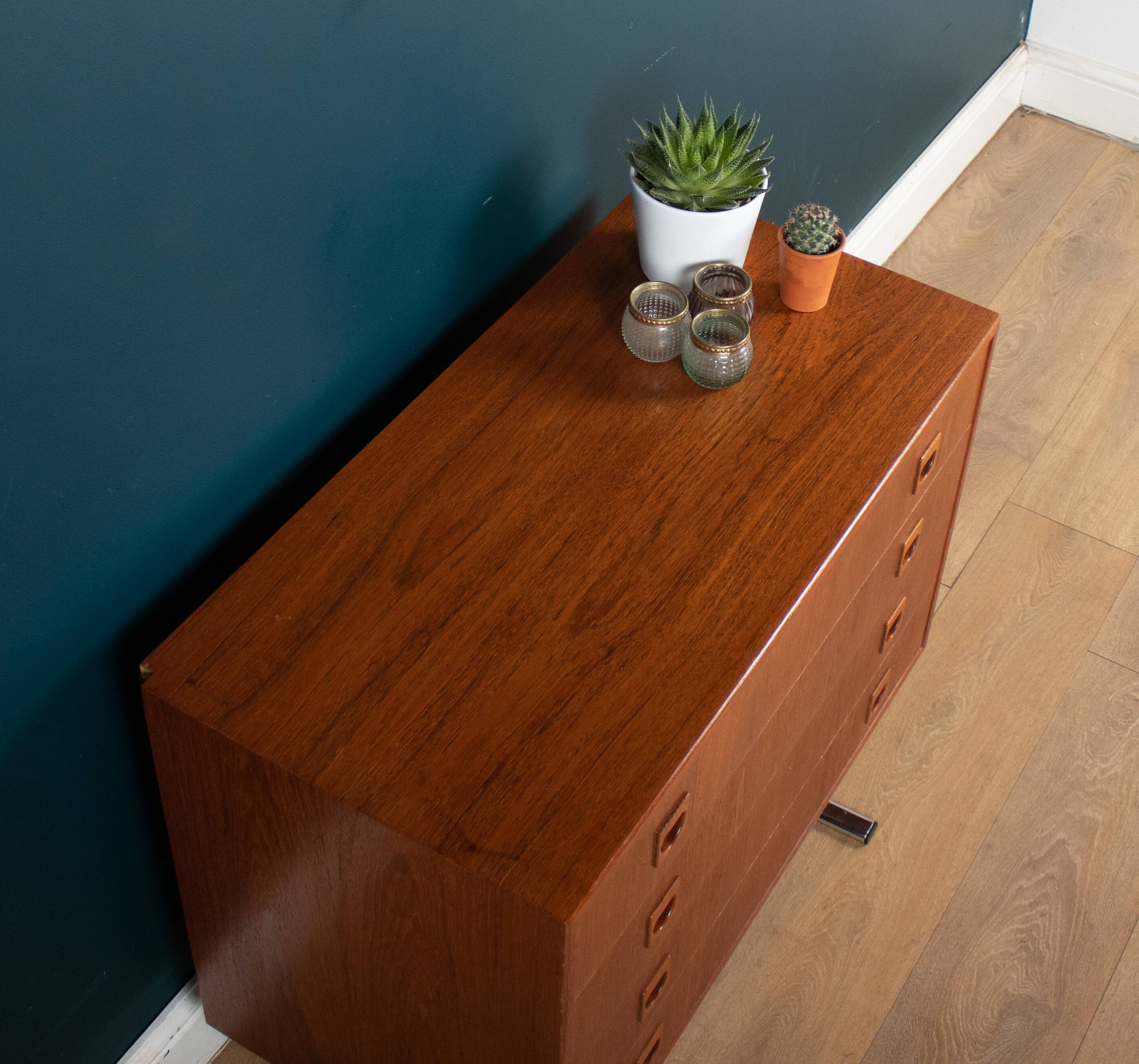Retro teak 1960s danish chest of drawers on metal legs