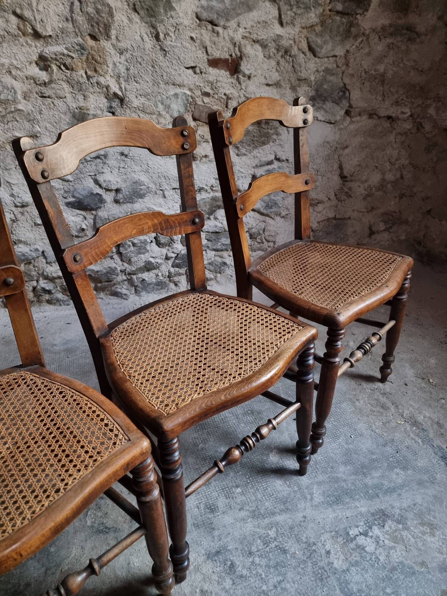 Set of 4 antique dining chairs with caned seats, beech, France, circa 1900–1920.