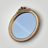 Antique small round wall mirror in gold resin - love knot