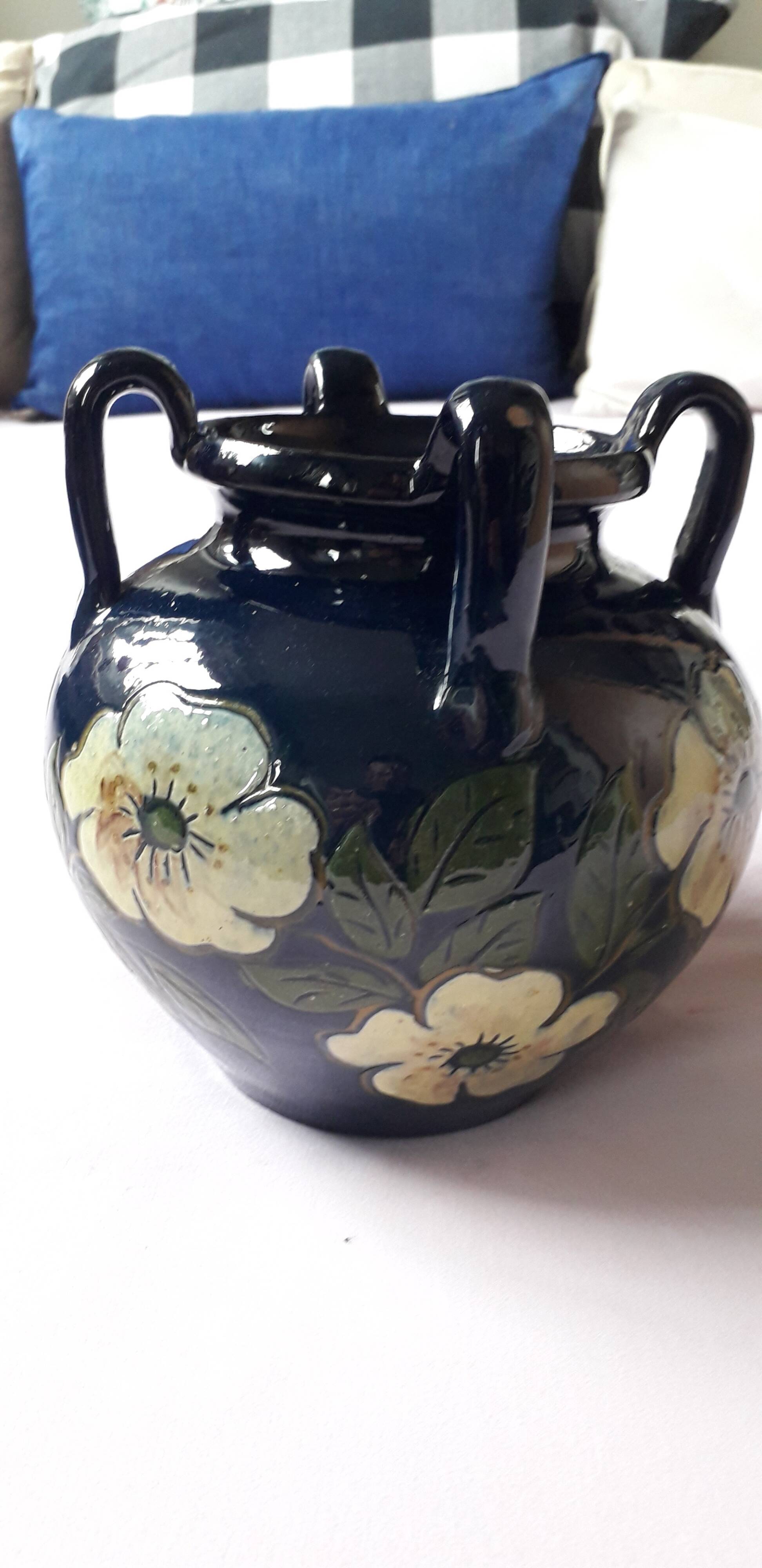 Antique Art Nouveau vase with floral decoration.
