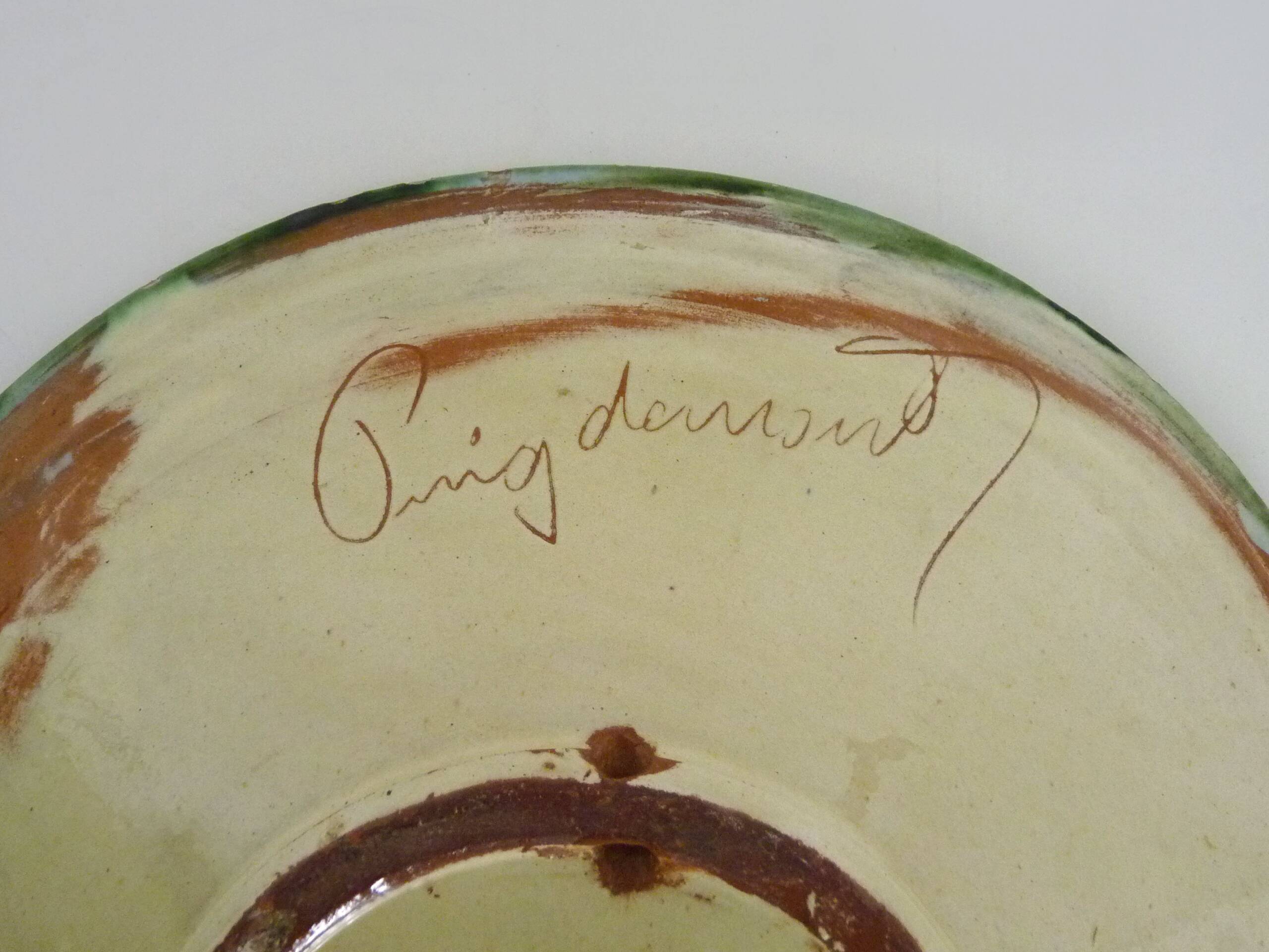 Decorative ceramic wall plate with fish decoration by Puigdemont.