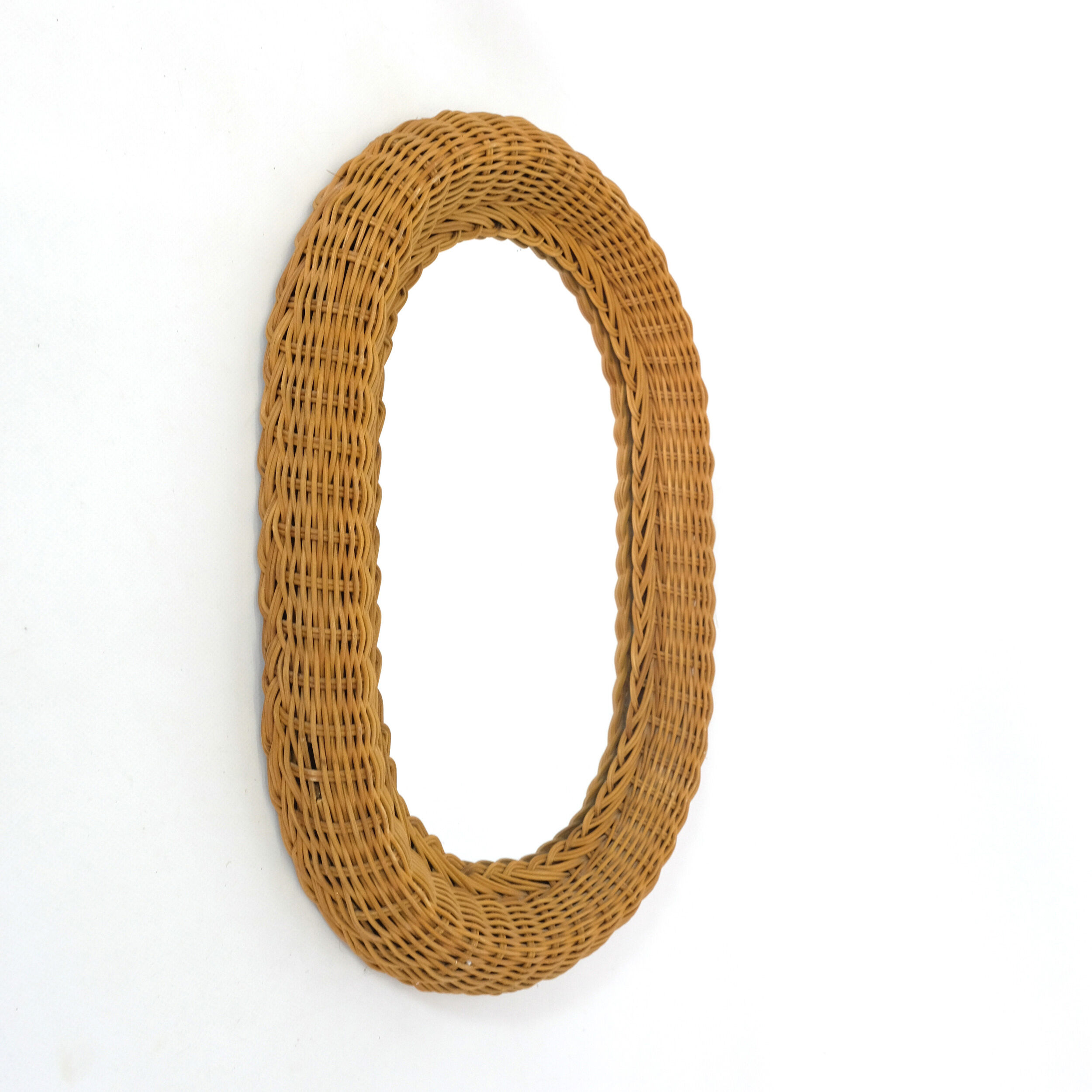 Mirror with thick wicker frame, 54x38 cm.
