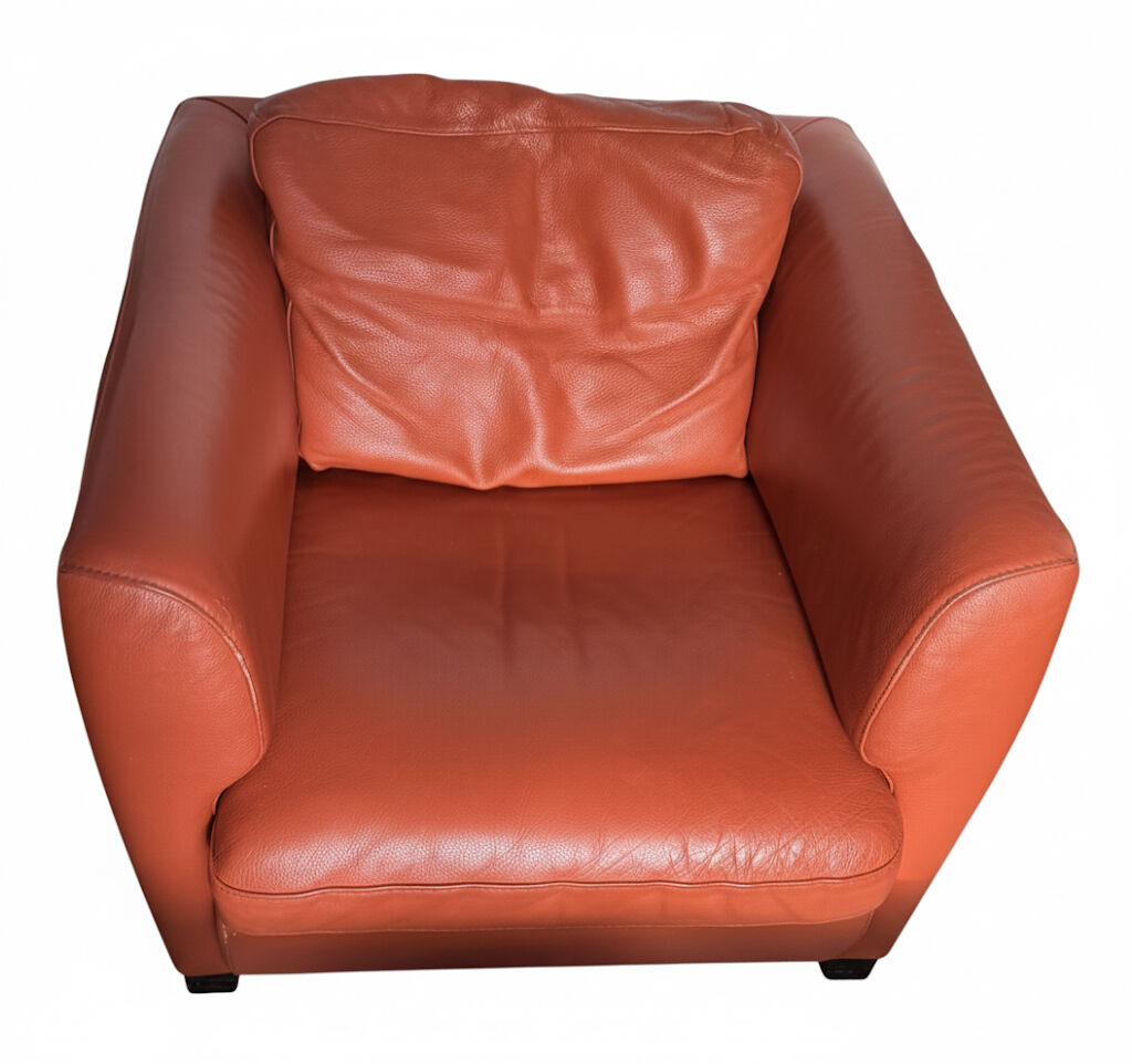 Roche Bobois armchair in mandarin colour.