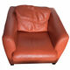 Roche Bobois armchair in mandarin colour.
