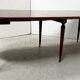 A six-foot Louis XVI style mahogany table from the 19th century.
