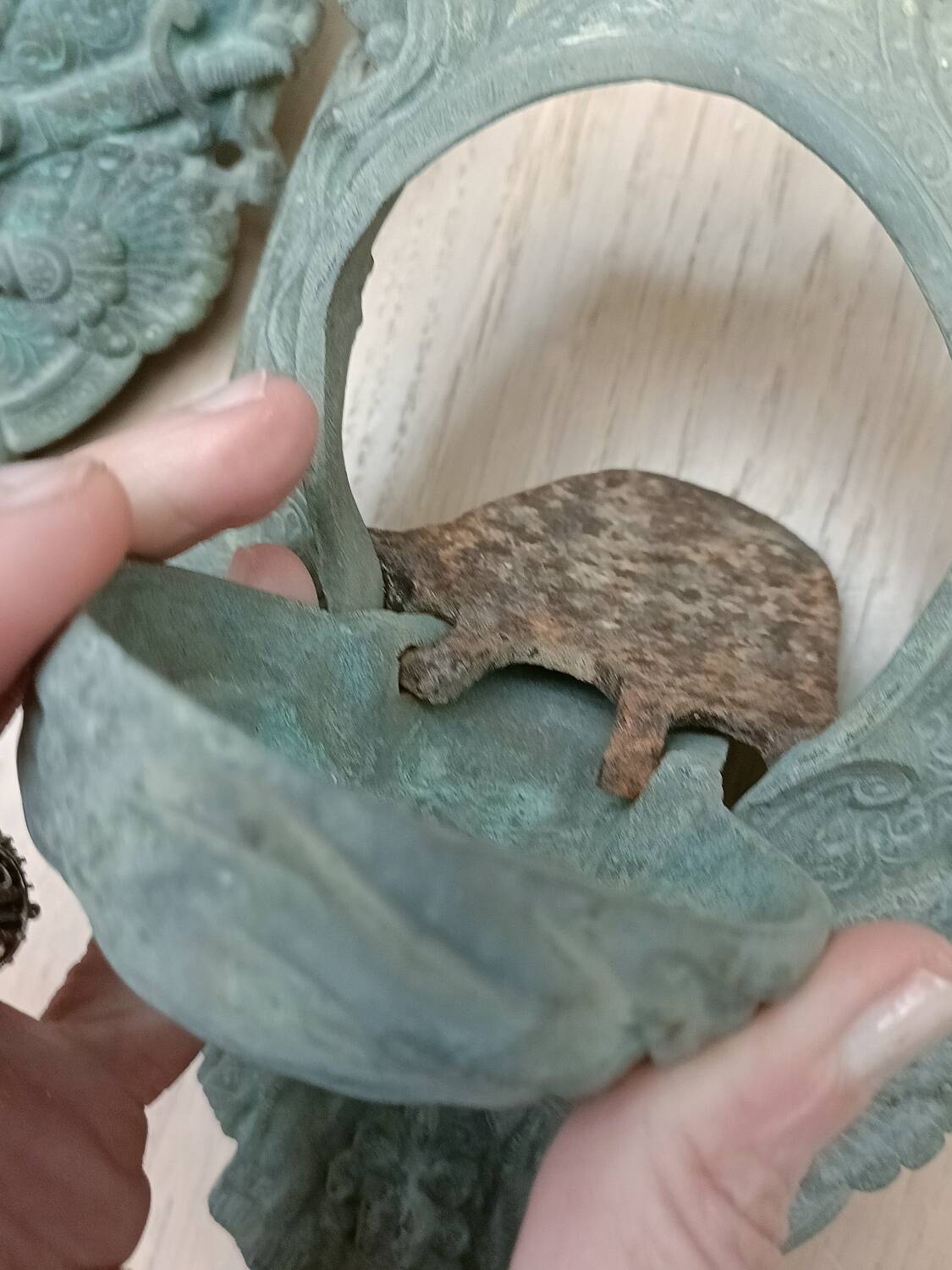 Bronze door knockers and billiard table corners