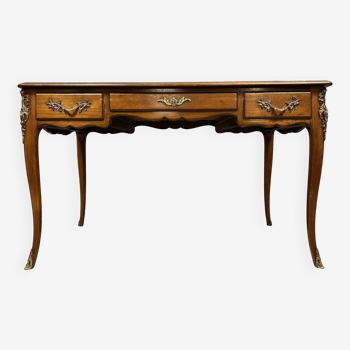 André Mailfert: Louis XV style double-sided desk in stamped walnut