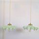 Pair of green opaline glass pendant lights – frosted poetry & Art Deco brilliance